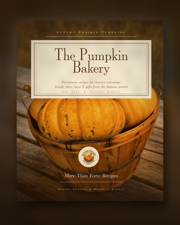 The Pumpkin Bakery cookbook cover, a bushel basket of pumpkins on weathered decking, from Autumn Prairie Pumpkins in Newton, Kansas