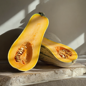 Sucrine du Berry squash cut in half - vivid orange flesh French heirloom
