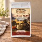 Harvest Moon medium roast coffee, 12 oz ground coffee bag on a wooden table