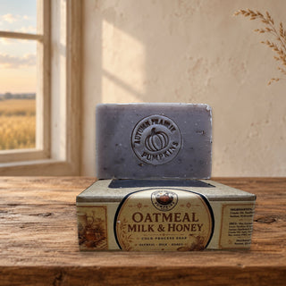 Oatmeal Milk & Honey handmade cold process soap bar and kraft box on a warm Kansas prairie farmhouse table