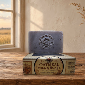 Oatmeal Milk & Honey handmade cold process soap bar and kraft box on a warm Kansas prairie farmhouse table