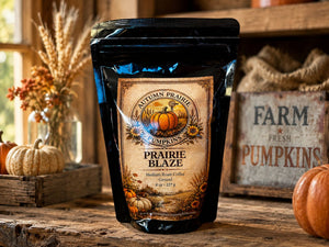 Prairie Blaze Coffee - 8 oz ground coffee bag on farm stand - bold medium roast