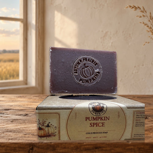 Pumpkin Spice handmade cold process soap bar and kraft box on a warm Kansas prairie farmhouse table